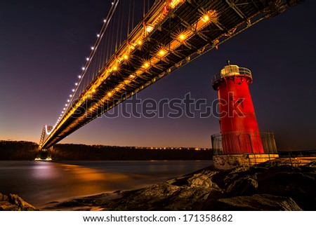 George Washington Bridge and the Red Little Lighthouse in Fort Washington Park, New York NY