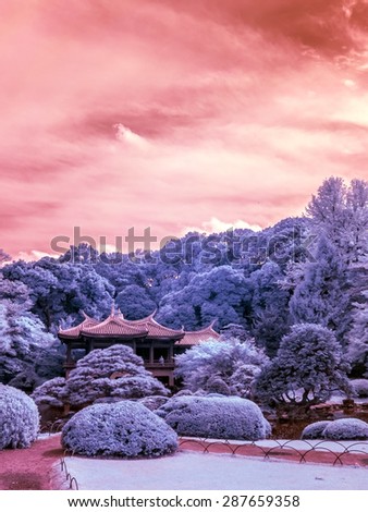 Shinjuku Park, Pagoda Tea-house, Tokyo, Japan. Taken with a specially modified camera that picks up and extended infrared range invisible to the eye.