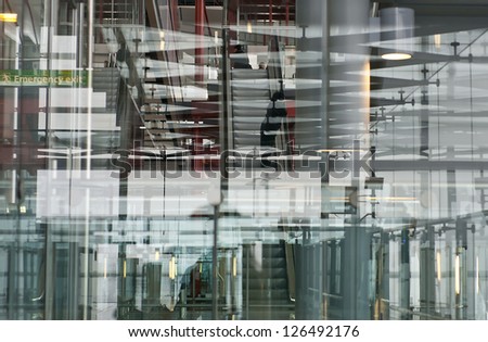 Multiple layers and reflection of a modern airport building.