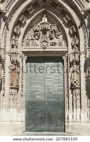Door of Saint Michael or Door of the Nativity in the Seville Cathedral, in Andalusia, Spain. It is the largest Gothic cathedral and the third-largest church in the world.