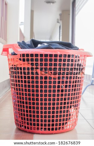a red laundry basket