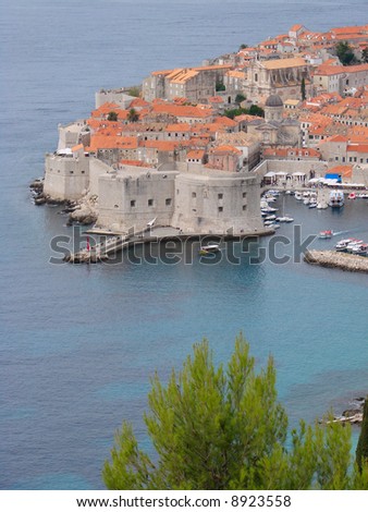 The best way to start a visit to Dubrovnik is by taking a walk around the City Walls, to get a feeling for the history of the city. Here Fort St. Ivan can be seen which guards the Old Harbor.