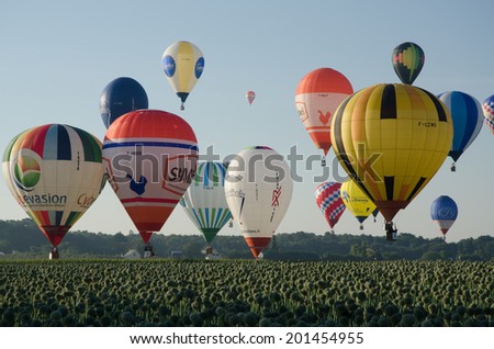 FRANCE BRISSAC-QUINCE 30 AUG: view of hot air baloons flying over fields near BRISSAC-QUINCE town on 30 august 2013