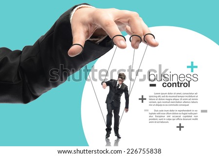 image of a puppet businessman standing on against each other, concept of business control