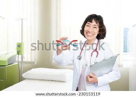 health care and medicine concept - Smiling medical doctor woman at hospital holding virtual DNA in the lab