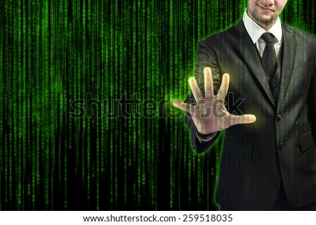 Businessman pressing at code list on digital touchscreen