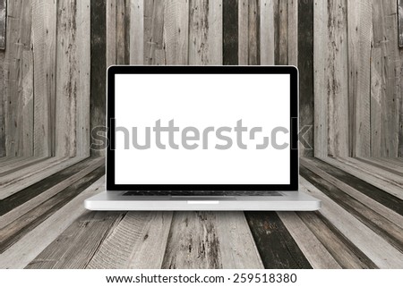 laptop computer on wood table with clipping path on Screen