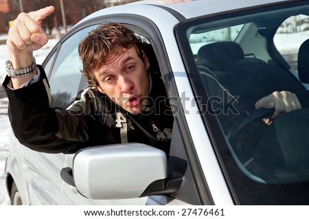 Aggressive driver, young man driving left side driving car aggressively