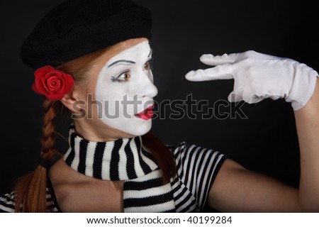 Portrait of a mime comedian,on black background