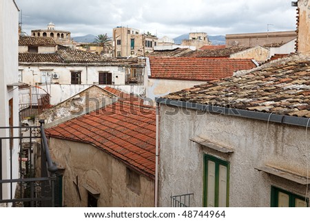 View on house roofs in narrow street. Sicily, Palermo