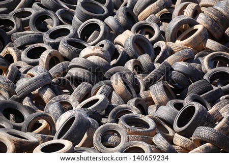 Heap of dumped old car tires