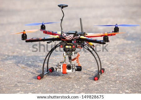Multicopter with camera in brushless gimbal and autopilot ready for take-off
