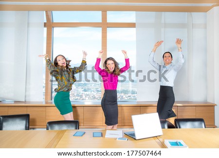 business women jumping to the office
