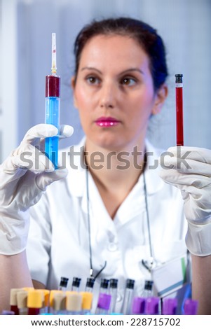 Young scientist woman working at the laboratory