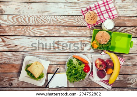 Close-up prepared by school lunches on the rustic background