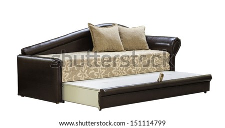 Arranged bed over white background. Colorful black leather couch.