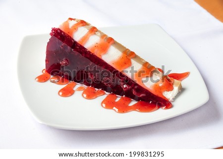 Slice of delicious strawberry cheese cake on plate