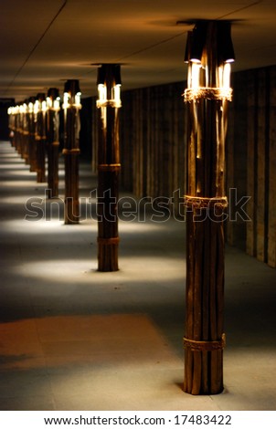row of pillars with lights on