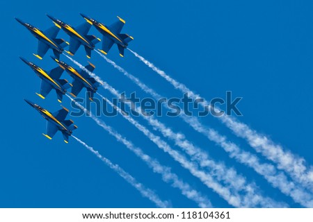 PENSACOLA, FL - NOVEMBER 2:US Navy Blue Angels in F-18 Hornet planes perform in air show routine in Pensacola, FL on November 2, 2012. Blue Angels are the oldest active aerobatic team in the world