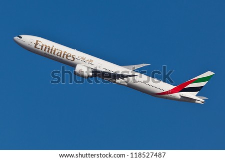 NEW YORK - JULY 7: Boeing 777 Emirates climbs after take off from JFK airport located in New York on July 7, 2012. Emirates is rated as a top 10 best airlines in the world flying on youngest fleet.