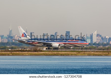 NEW YORK - DECEMBER 6: Boeing 777 American Airlines lining up on JFK Runway in New York USA on December 6 2012 American Airlines is one of the oldest American airlines and one of the biggest in world