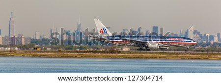 NEW YORK - DECEMBER 6: Boeing 777 American Airlines lining up on JFK Runway in New York USA on December 6 2012 American Airlines is one of the oldest American airlines and one of the biggest in world