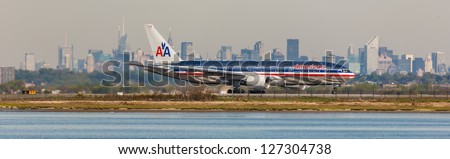 NEW YORK - DECEMBER 6: Boeing 767 American Airline lining up on JFK runway in New York USA on December 6, 2012. American Airline is one of the biggest and oldest airline in the world