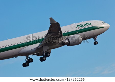 NEW YORK - DECEMBER 8: Alitalia Airbus 330 on final approach to JFK airport in New York, USA on December 8, 2012. Alitalia is a flag carrier airline of Italy and one of the biggest airlines in Europe