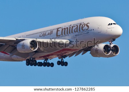 New York - December 9: A A38 Emirates Approaches Jfk Airport In New York, Usa On December 9 2012. Airbus A380 Is The World\'S Biggest Jet Airliner And The First To Have Two Full Decks