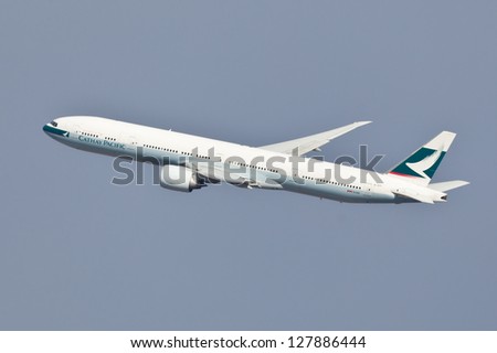 NEW YORK - DECEMBER 9:Boeing 777 Cathay Pacific climbs after take off from JFK Airport in New York on December 9, 2012 Cathay Pacific is flag carrier of Hong Kong and the world\'s third largest airline