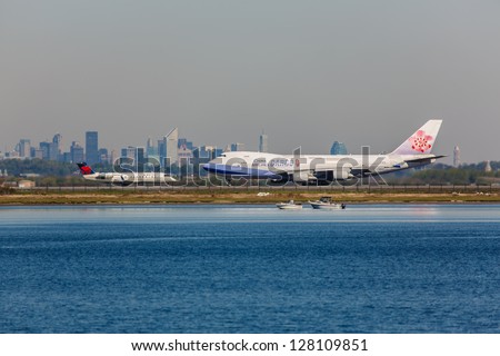 NEW YORK - DECEMBER 6: Boeing 747 China Airlines lining up on JFK runway in New York USA on December 6, 2012. China Airlines is Taiwan\'s largest airline company and one of Asia\'s leading carriers