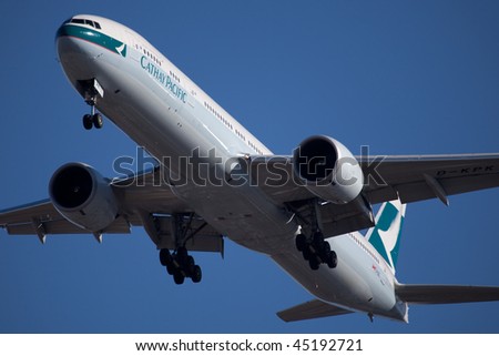 NEW YORK - JANUARY 6: A Boeing 777 Cathay Pacific arrives at JFK Airport on Runaway 31R on January 6, 2010 in New York.