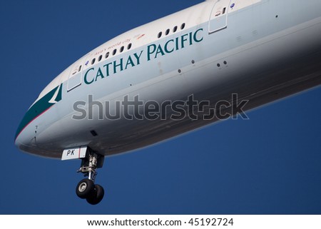 NEW YORK - JANUARY 6: A Boeing 777 Cathay Pacific arrives at JFK Airport on Runaway 31R on January 6, 2010 in New York.
