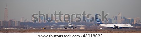 NEW YORK - JANUARY 6: A Airbus A320 plane  , Jet Blue departs from JFK Airport Runway 4L January 6, 2010 in New York