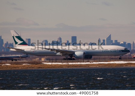 NEW YORK - MARCH 1: A Boeing 777 Cathay Pacific  departing form JFK Airport Runway 4R on March 1, 2010 in New York