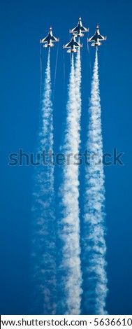 OCEAN CITY, MD - JUNE 15: US Air Force Demonstration Team Thunderbirds. Flying on f-16 showing precision of formation flying during the annual OC Air Show on June 15, 2010 in Ocean City, Maryland.