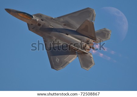 LAS VEGAS - NOVEMBER 13: F-22 Raptor, only 5 generation plane performing high speed pass during annual air show called Aviation Nation on November 13, 2010 in Las Vegas, NV, USA