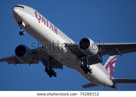 NEW YORK - JUNE 5: Boeing 777 Qatar on final approach to JFK in New York, USA on June 5, 2010. Qatar Airline is rated as top3 best airlines in the world. Qatar airline is flag carrier airline of Qatar