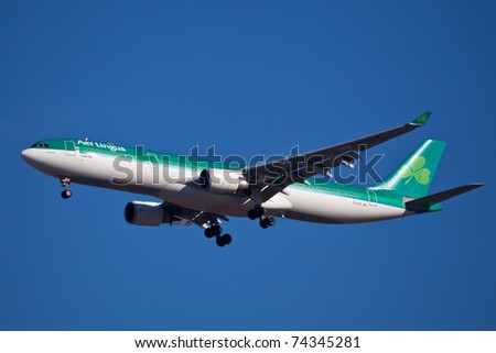 NEW YORK - JANUARY 25: A330 AerLingus Approaching JFK in New York, USA on January 25, 2011. Aerlingus is the biggest Irish airline, Call sign used by the airline is Shamrock