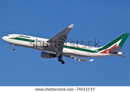 NEW YORK - MAY 10: AlItalia Boeing 767 on final approach to JFK airport located ion New York, USA on May 10, 2010. AlItalia is a flag carrier airline of Italy and one of the biggest airlines in Europe