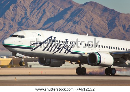 LAS VEGAS - NOVEMBER 15: Boeing 767 Alaska Airline touching down on McCarran in Las Vegas, USA on November 15, 2010. Alaska\'s route system spans more than 92 cities in United States, Canada, and Mexico