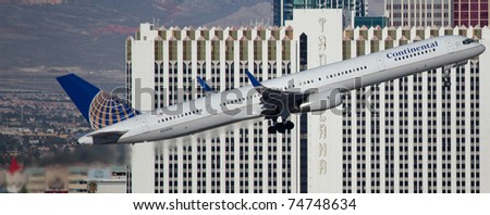 LAS VEGAS - NOVEMBER 14: Boeing 757 Continental climbs after take off from McCarran in Las Vegas, USA on November 14, 2010. Continental is no longer exist airline been merged into the United Airline