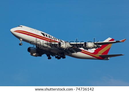 NEW YORK - MARCH 14: Boeing 747 Kalitta approaching JFK in New York, USA on March 14, 2011 Kalitta provides domestic and international scheduled cargo service and support for US Department of Defense