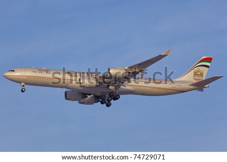 NEW YORK - MARCH 10: Airbus A340-600 of Etihad approaching JFK in New York, USA on March 10, 2011, Etihad is one of the most expensive and rated top5 best airlines in the world