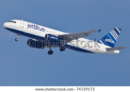 NEW YORK - JANUARY 15: A320 JetBlue on final approach to JFK in New York, USA on January 15, 2011. JetBlue is New York based, fastest growing airline in the world. They use Airbuses and Embraers