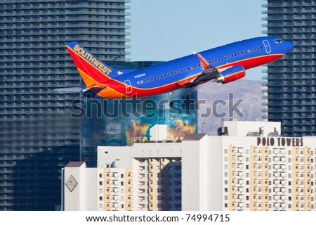 LAS VEGAS - NOVEMBER 14: Boeing 737 Southwest airline climbs after take off from Mccarran airport in Las Vegas, USA on November 14, 2010. Southwest is the largest airline in the United States as of 2011