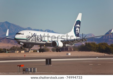 LAS VEGAS - NOVEMBER 15: Boeing 737 Alaska Airline touches down in McCarran in Las Vegas, USA on November 15, 2010. Alaska\'s route system spans more than 92 cities in United States Canada and Mexico
