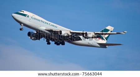 NEW YORK - FEBRUARY 4: Boeing 747 Cathey Pacific climbs after take off from JFK airport in New York, NY, USA on February 4, 2011. Cathey, founded on September 24 1946 is flag carrier airline of Honk Kong