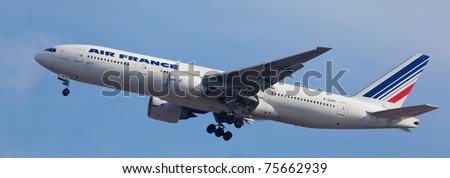 NEW YORK - JANUARY 12: Boeing 777 Air France arrives at JFK in New York, USA on January 12, 2011. Air France is the biggest airline in Europe. Air France is rated top10 best airlines in the world