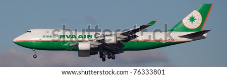 NEW YORK - JANUARY 5: A Boeing 747-400 (B-16483) EVA AIR Cargo from China arrives at JFK runway 22R on January 5, 2010 in New York. he Boeing 747 is a long-range, wide-body jumbo jet airliner
